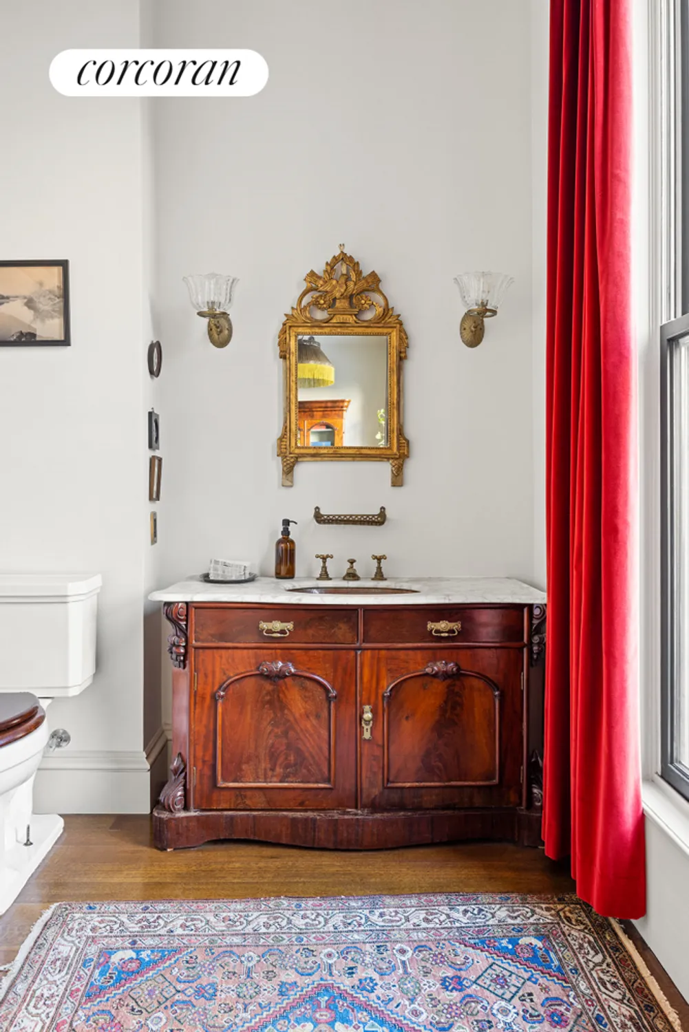 bathroom with wood cabinet as vanity