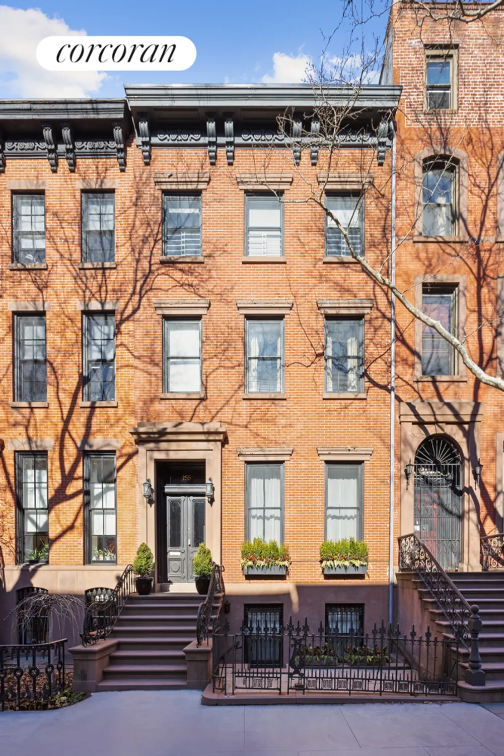 brick and brownstone exterior of the row house