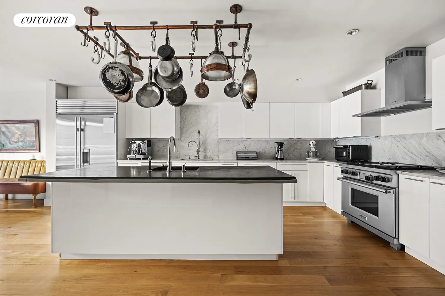 kitchen with large island and white cabinets