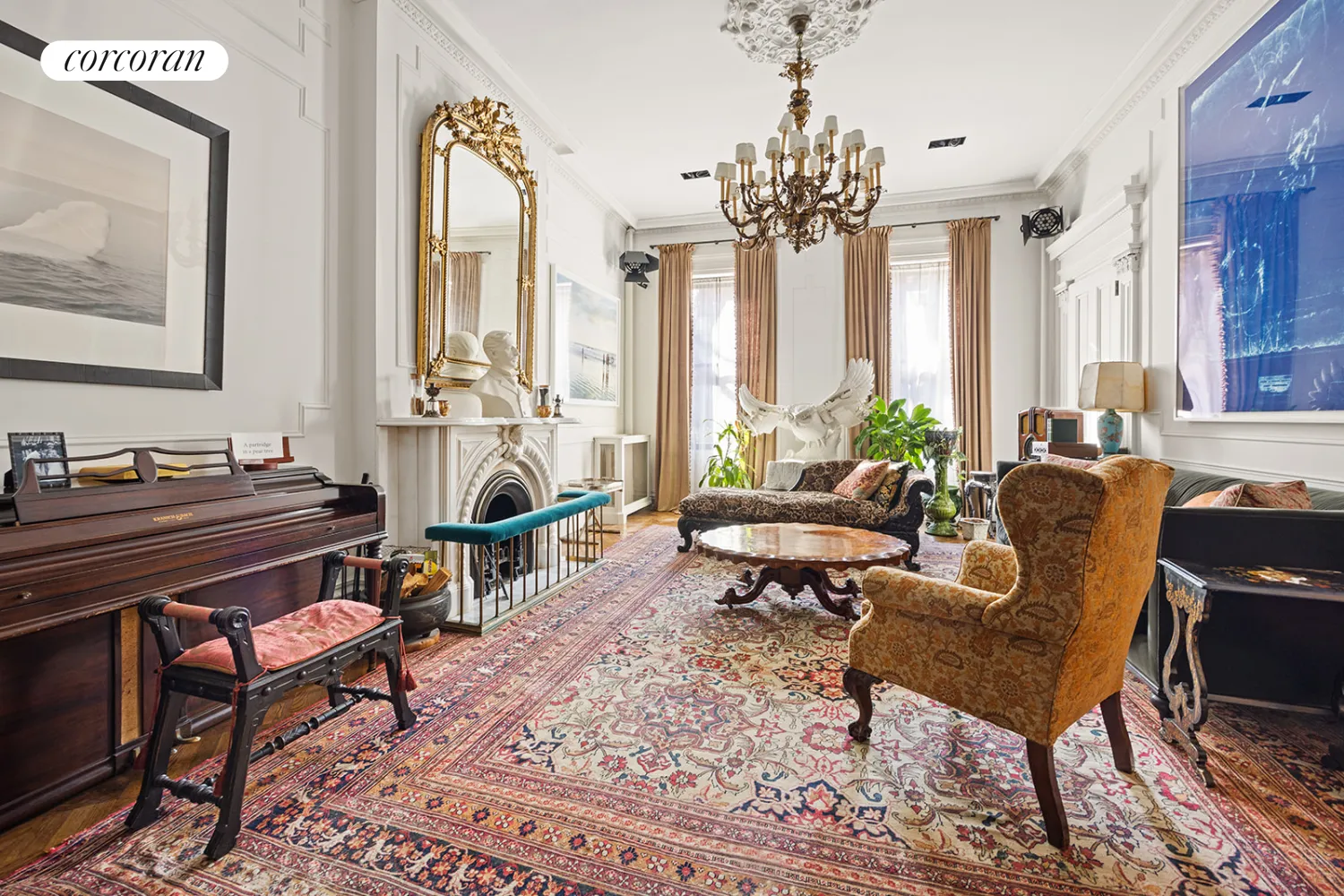 parlor with wall moldings, mantel