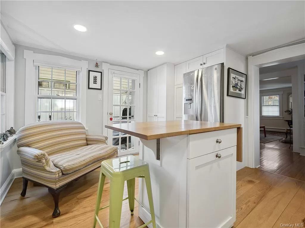 kitchen with small island with hinged top