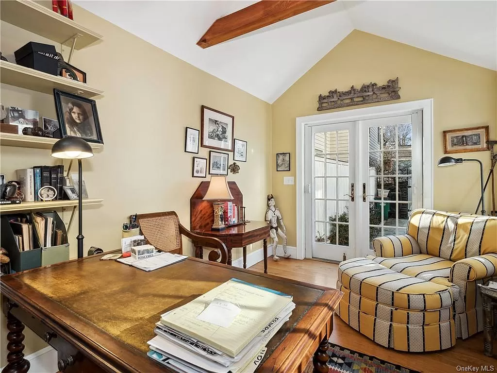 office set up in the rear lot house with french doors to the garden