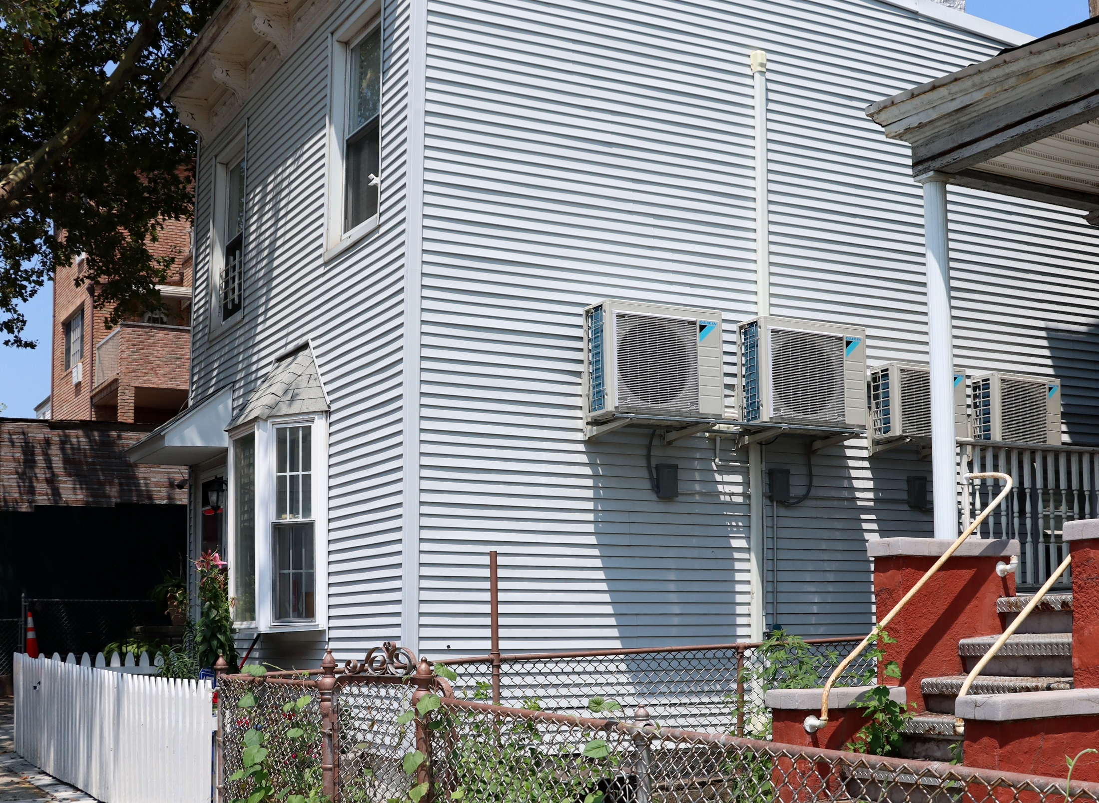 condensers on the side of a house