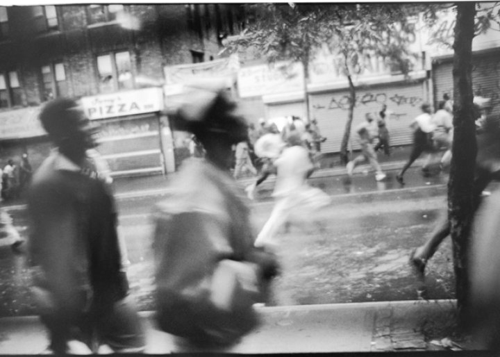 sylvia plachy black and white photograph of people running