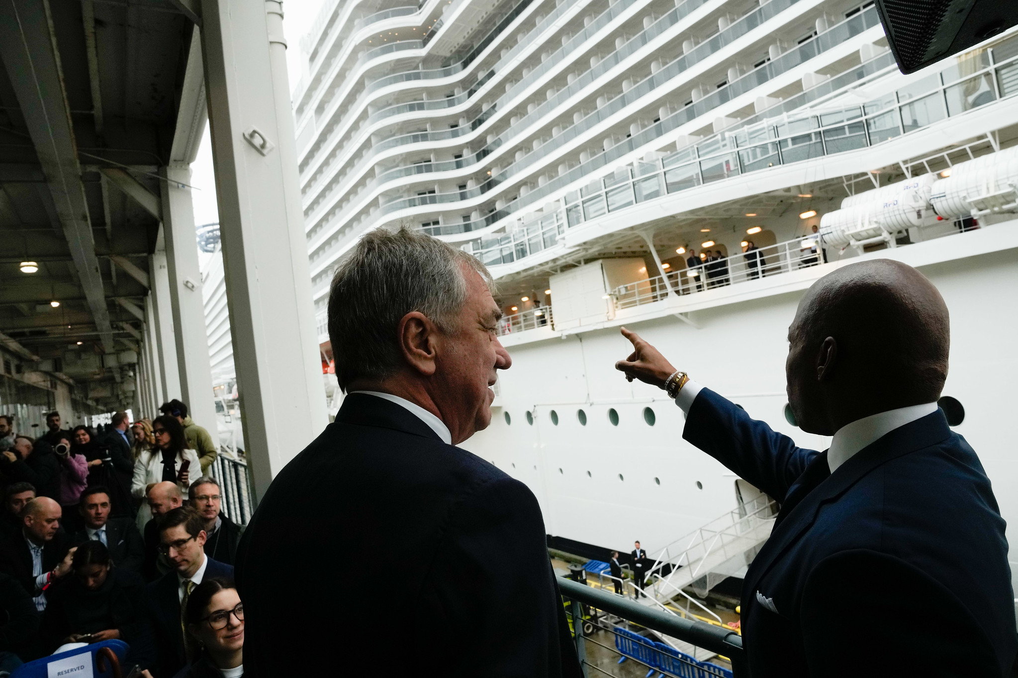 mayor points at a cruise ship