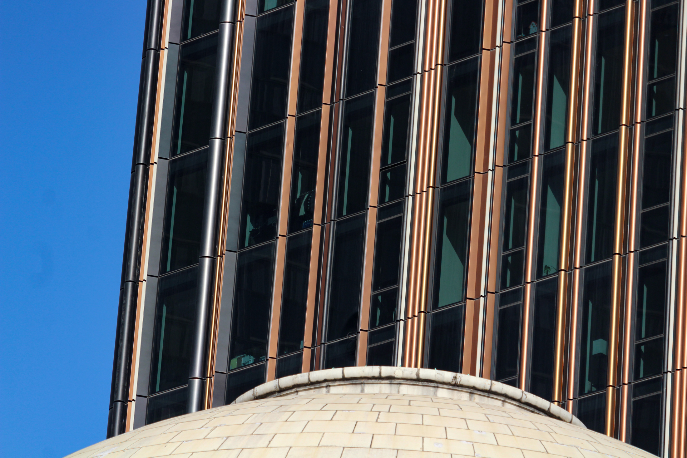 dome with closeup of modern building behind