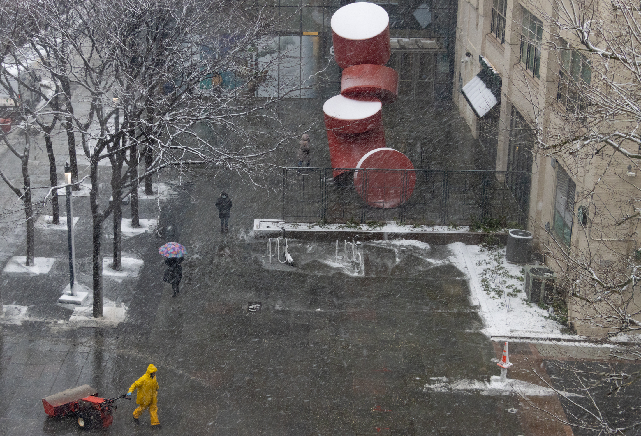 brooklyn news - people walking through the snow in downtown brooklyn