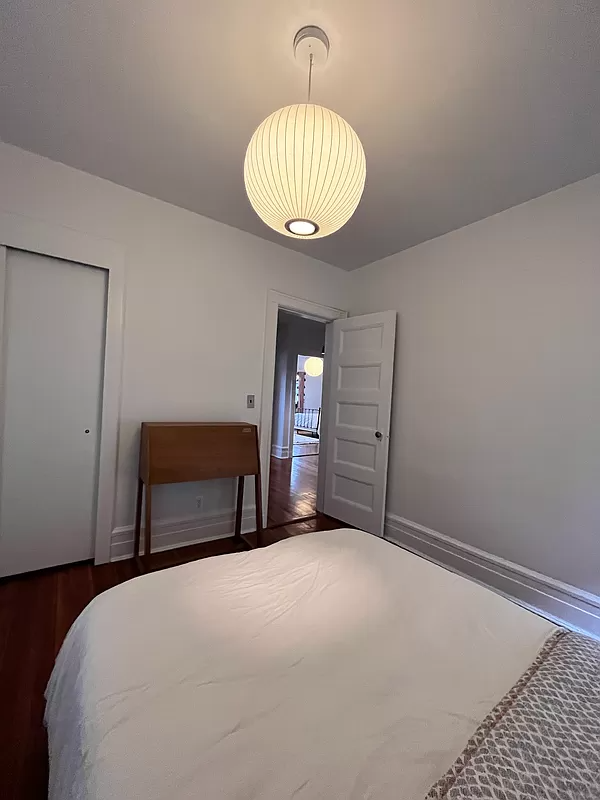 bedroom with wood floor