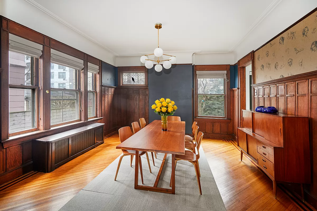 dining room with two exposures and wainscoting