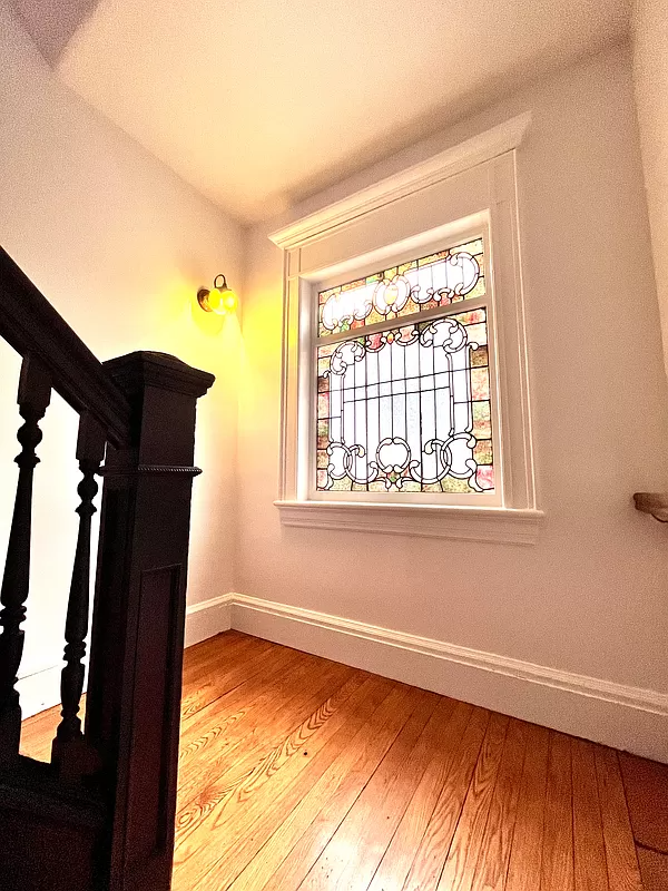 stained glass on the stair landing