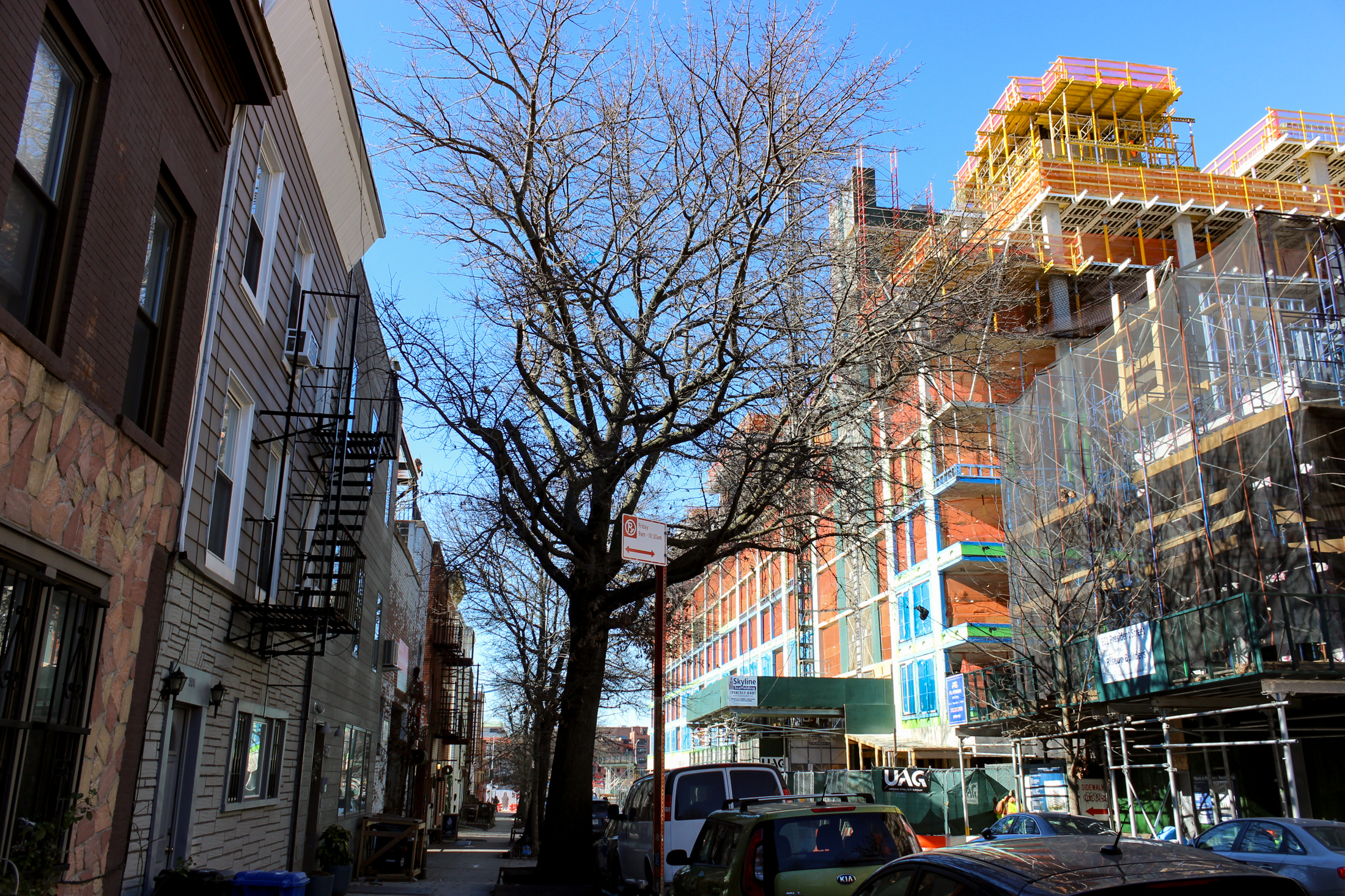 streetview with new construction on one side and older homes on the other side of the street