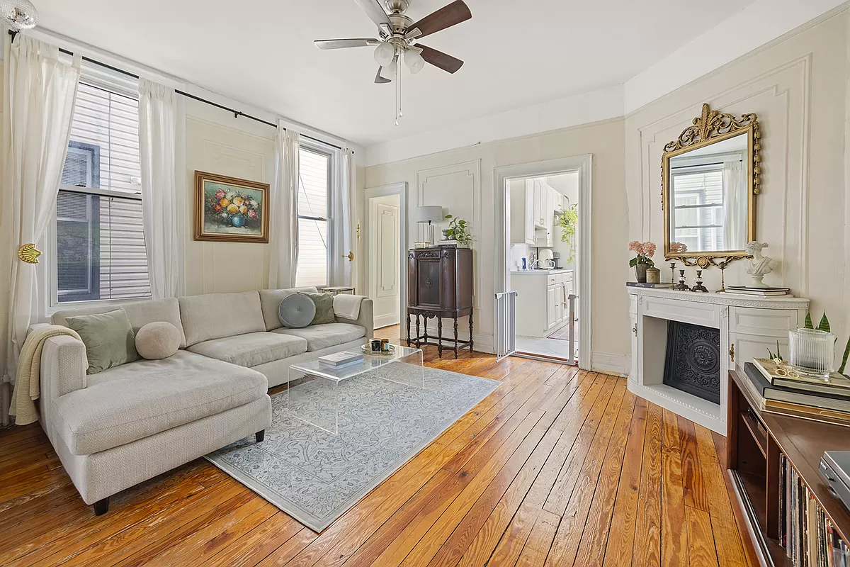 a living room with wall moldings