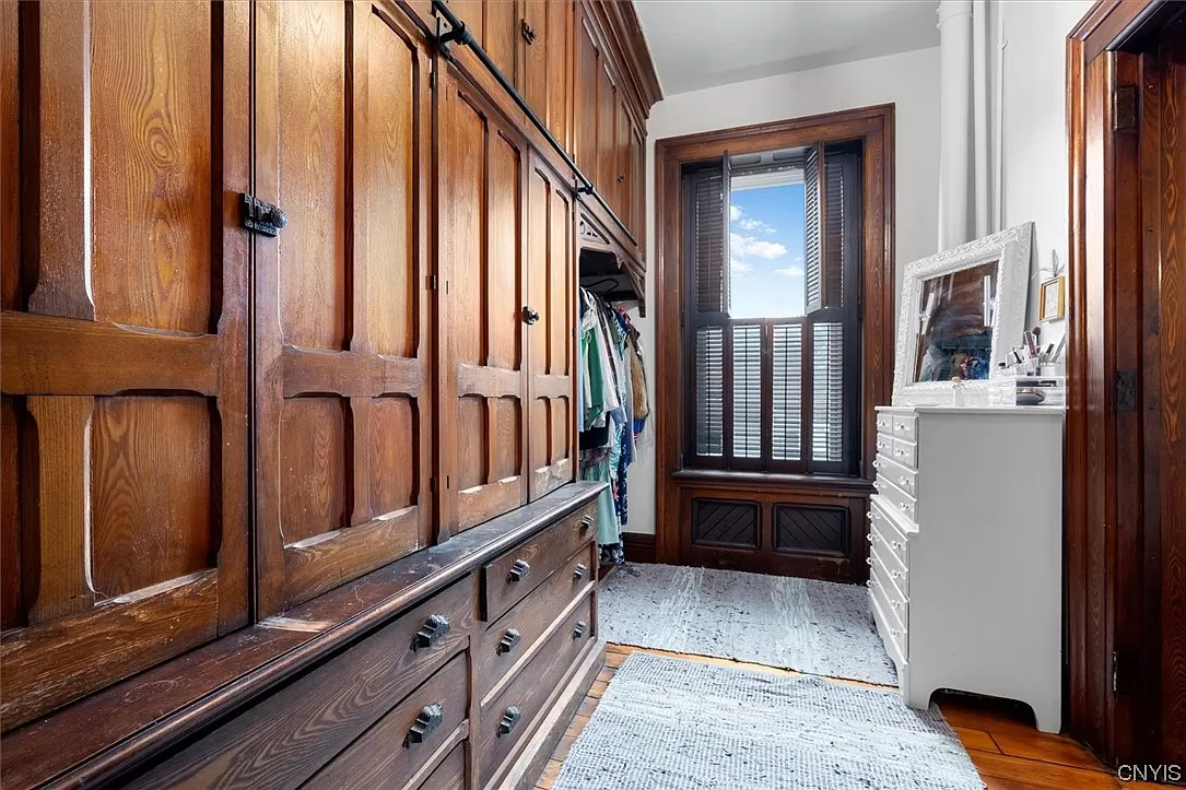 closet with original wood built-in storage