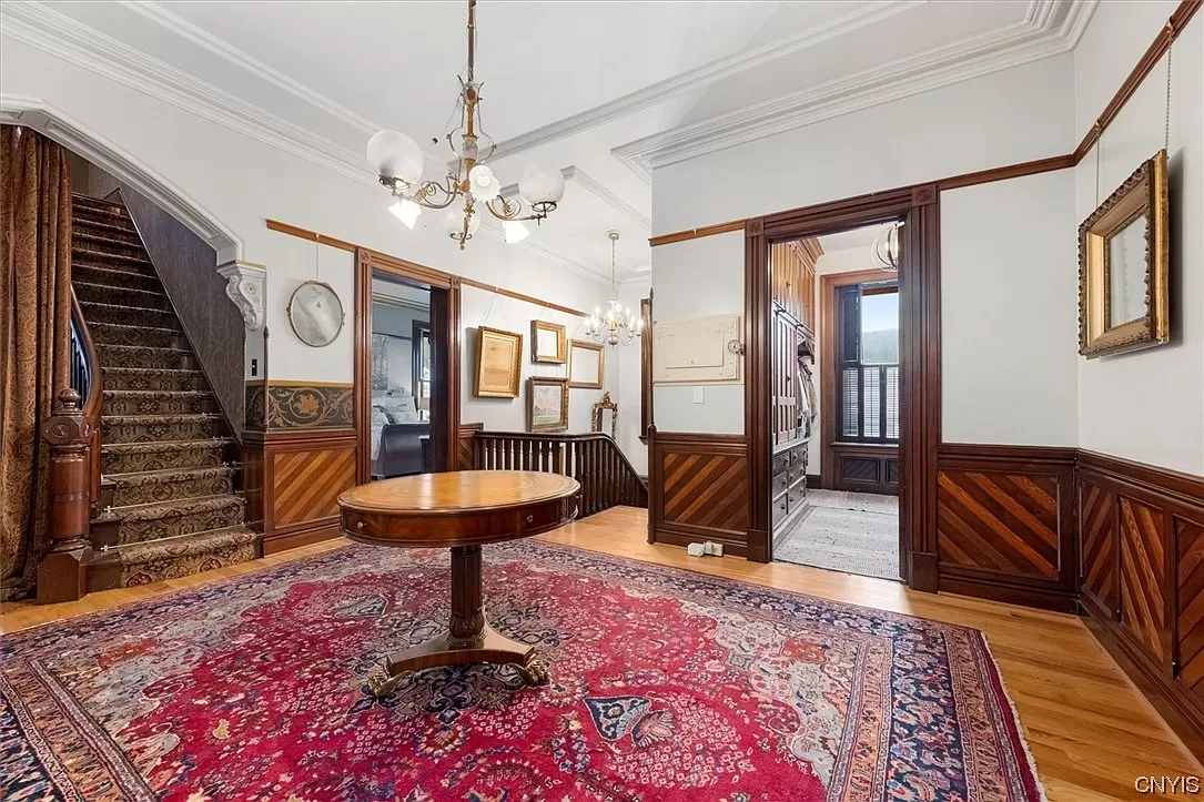 central hall with wood wainscoting