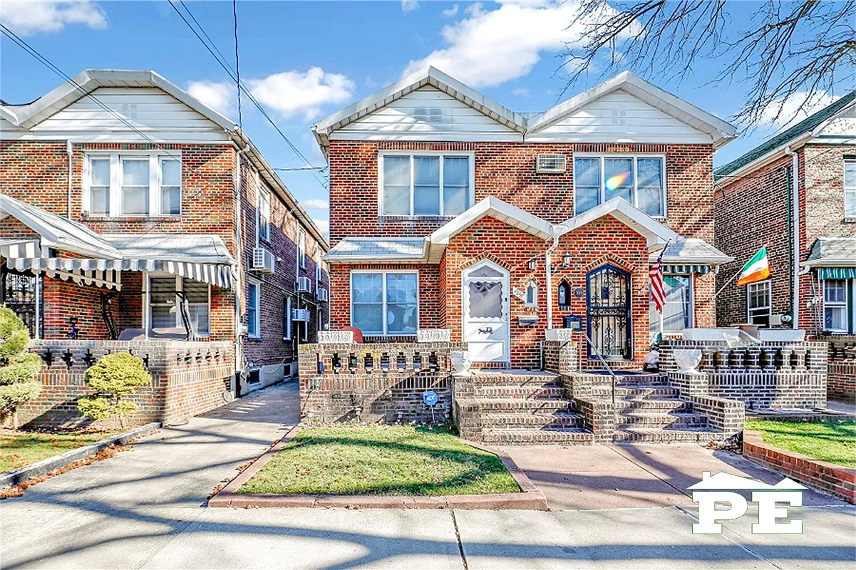 brick semi-detached house with with shared driveway