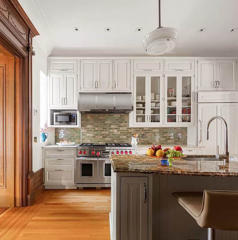 kitchen with white cabinets and wood floor