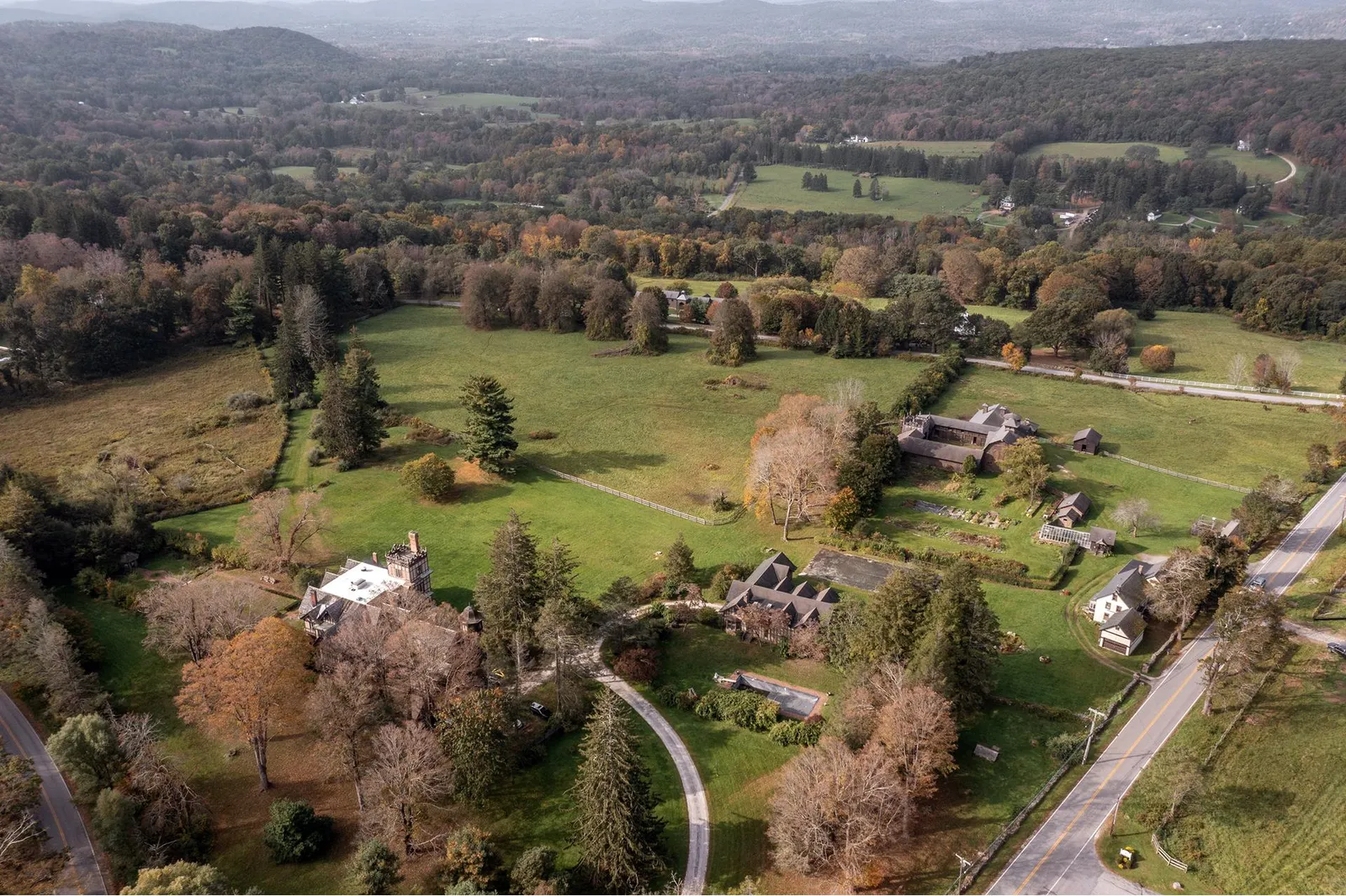 aerial showing the house and barn complex