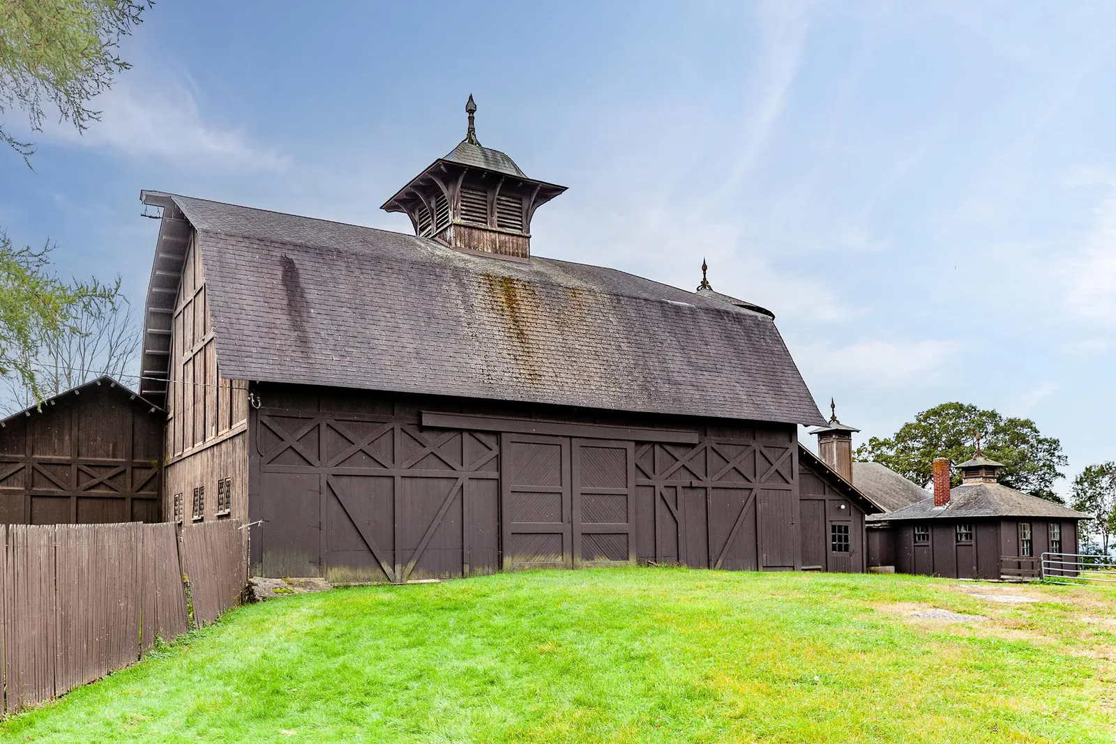 a barn with a cupola