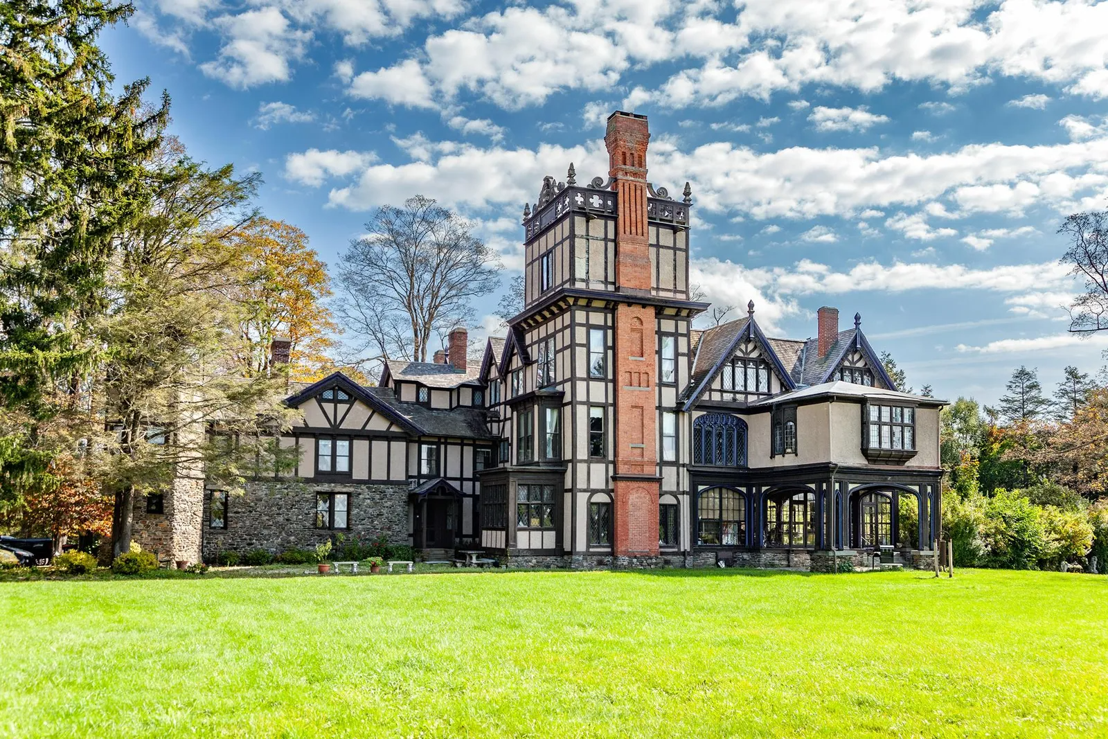 pawling - house exterior with massive brick chimney, half timbering and complex roofline