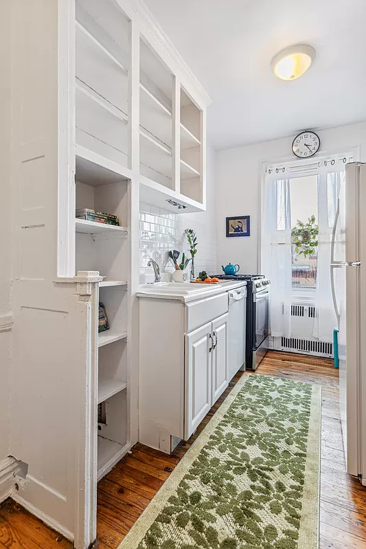 kitchen with white cabinets and a dishwasher