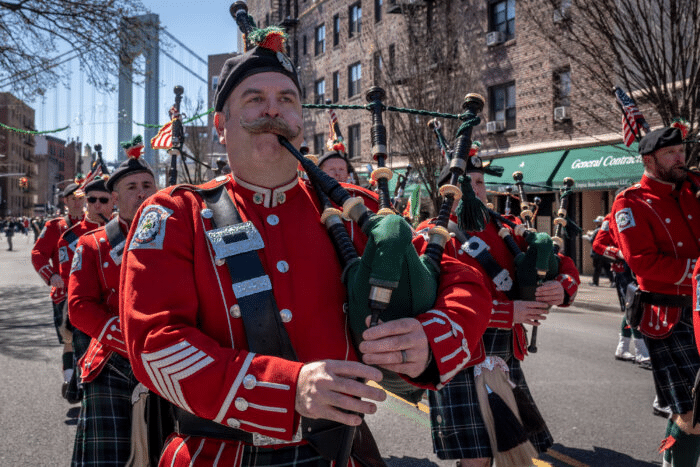 bagpiper in red uniform 