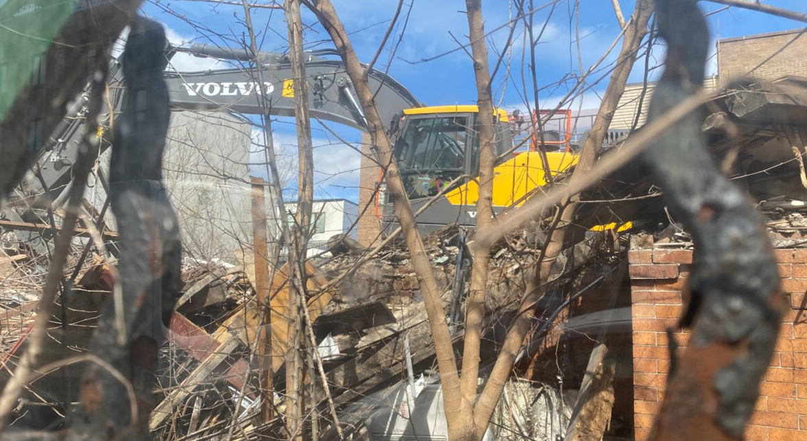 borough park - rubble and an excavator