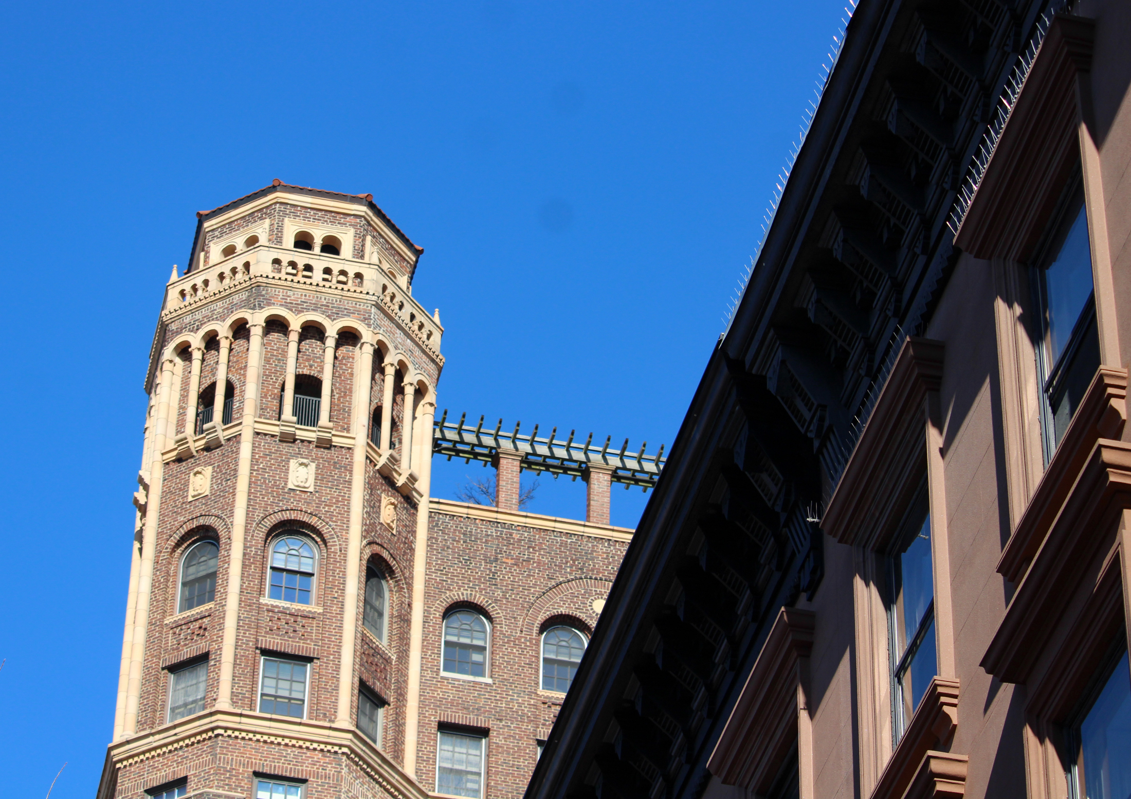 brooklyn - a brownstone and the tower fo the former Leverich Towers building