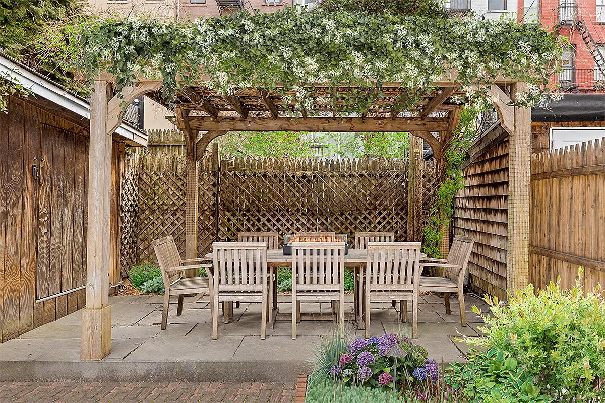 pergola in the day time virtually staged with greenery