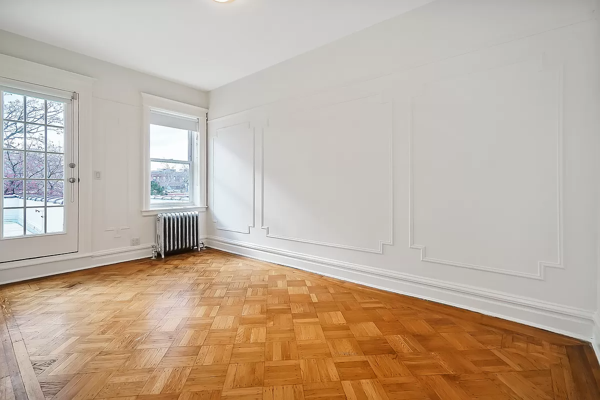 bedroom with door to wood deck