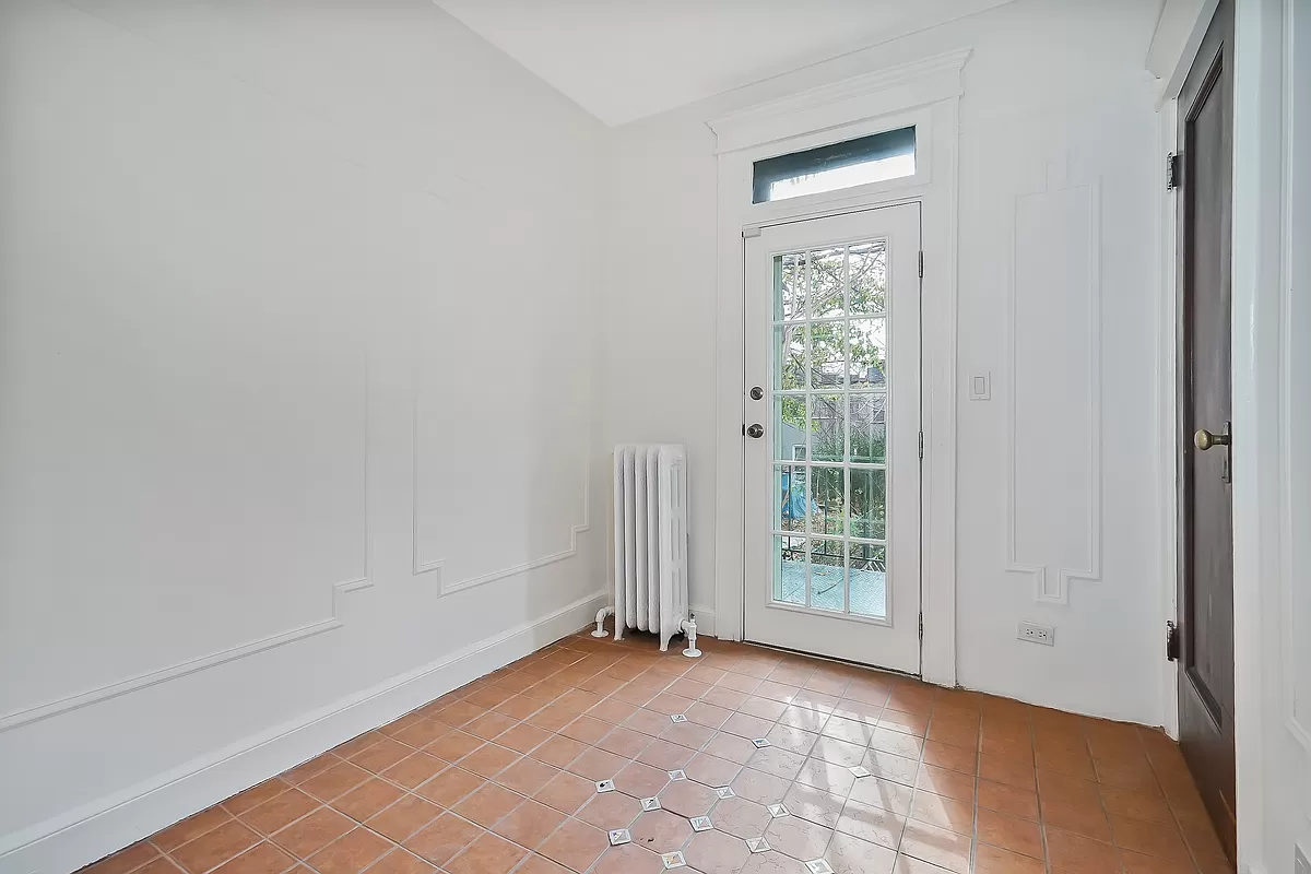 office with tiled floor and wall moldings