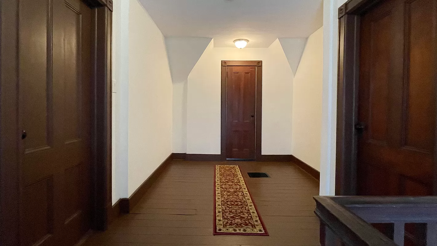 hall with painted wood floor