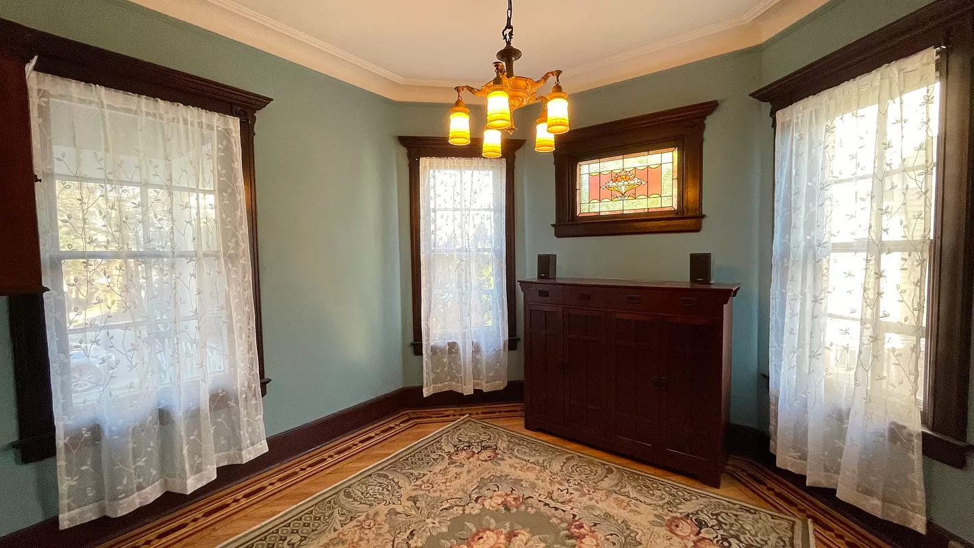 parlor with stained glass window