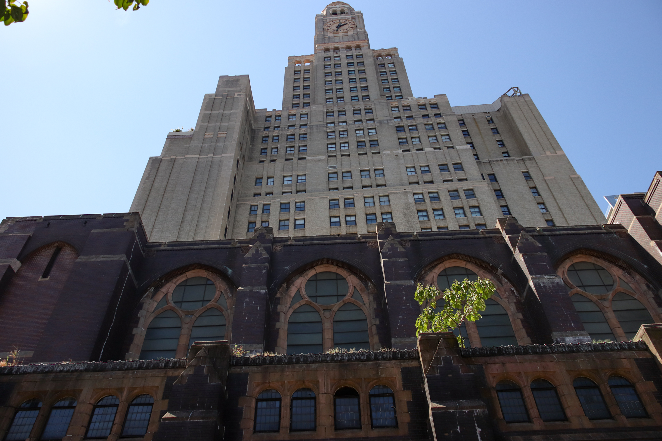 the felix street facade of the church with the williamsburgh savings bank tower behind