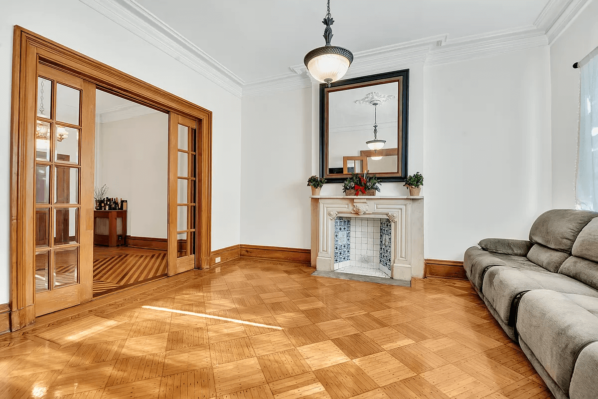 greenpoint open house - parlor with mantel and wood floor