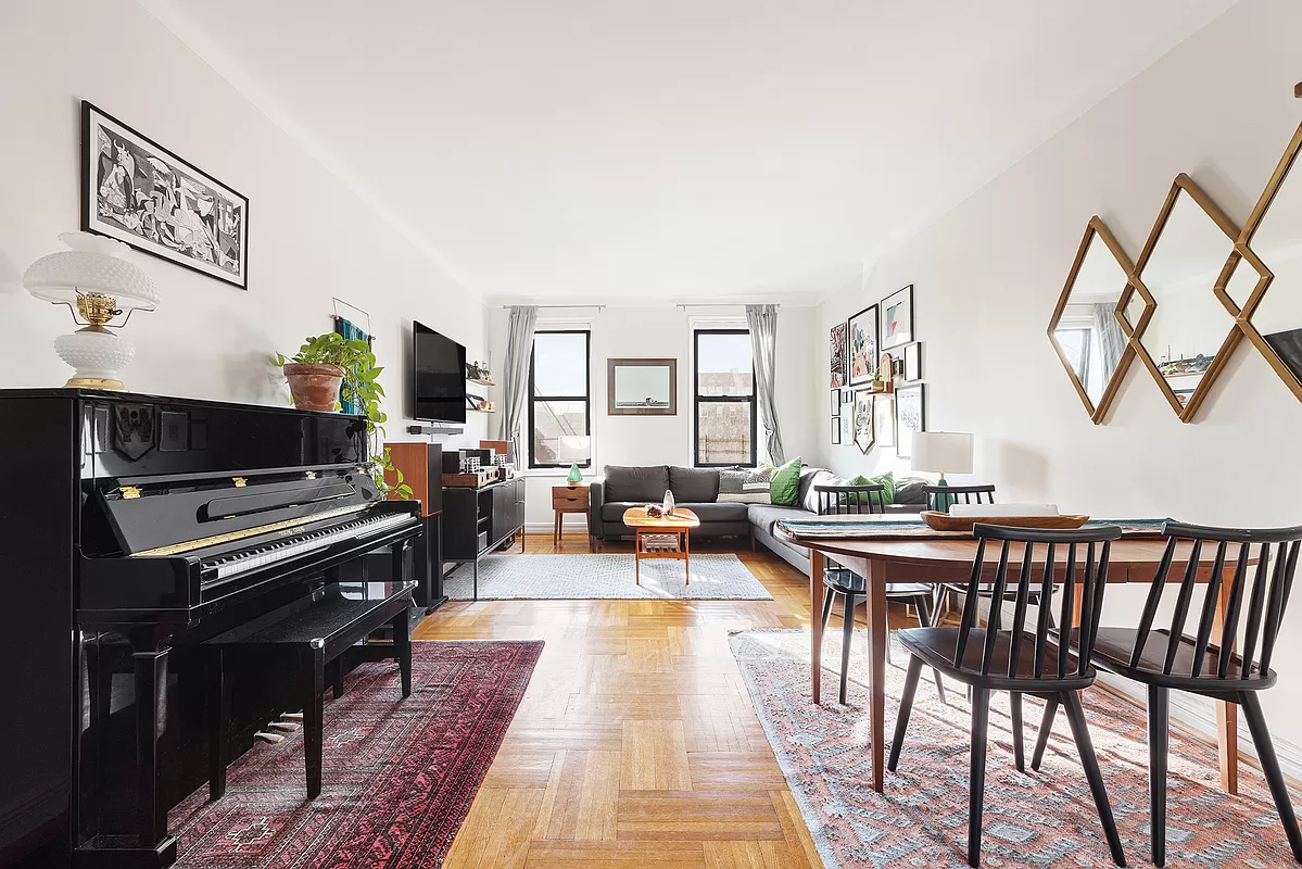 kensington - living room with wood floor and two windows