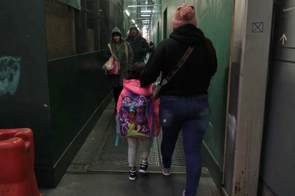 family walking on sidewalk