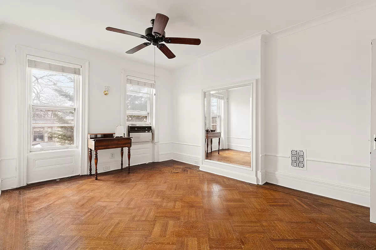 bedroom with wood floor