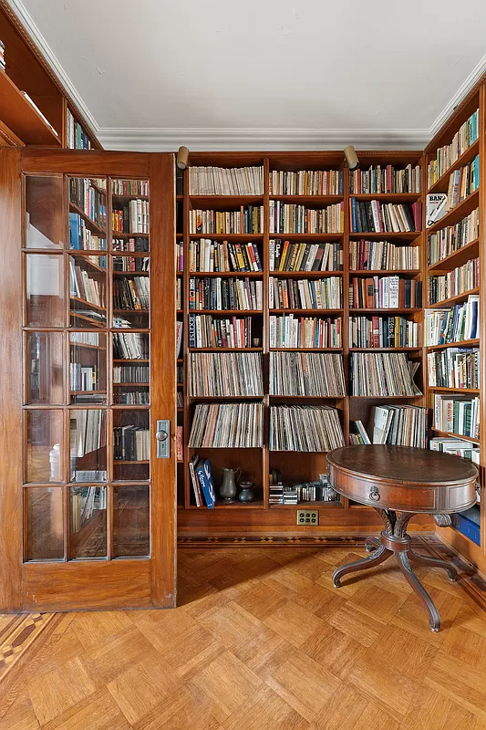 middle parlor with built-in bookshelves