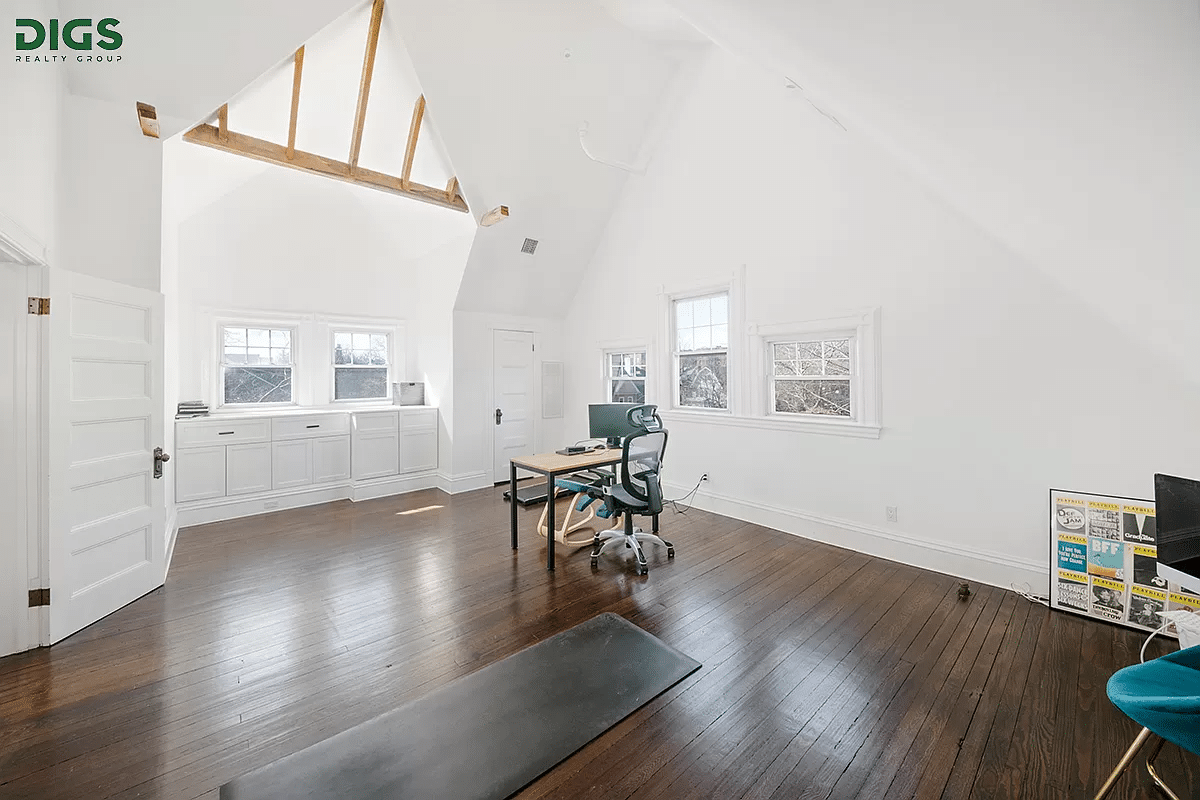 top floor with an office with high ceilings