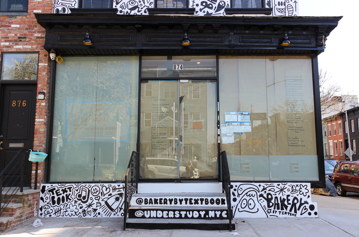 the papered glass storefront of the future bakery