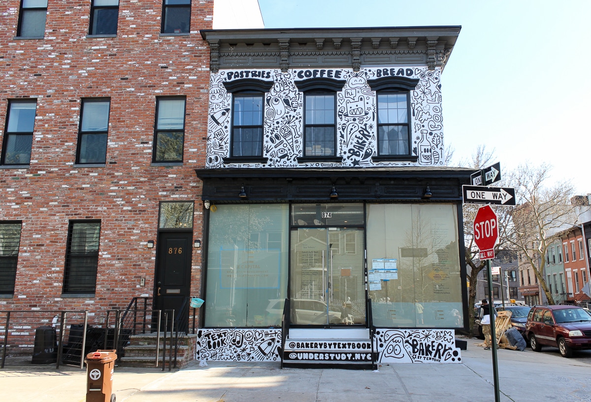 future bakery with black and white illustrations painted on the building