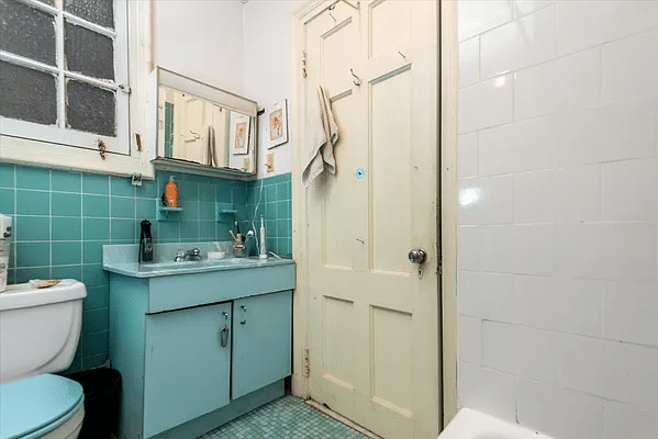 bathroom with blue floor tiles