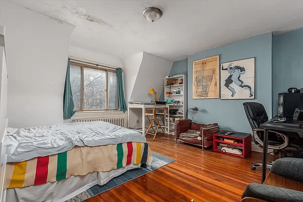 bedroom with wood floor