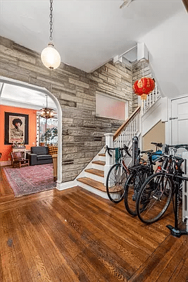 stair hall with faux stone wall