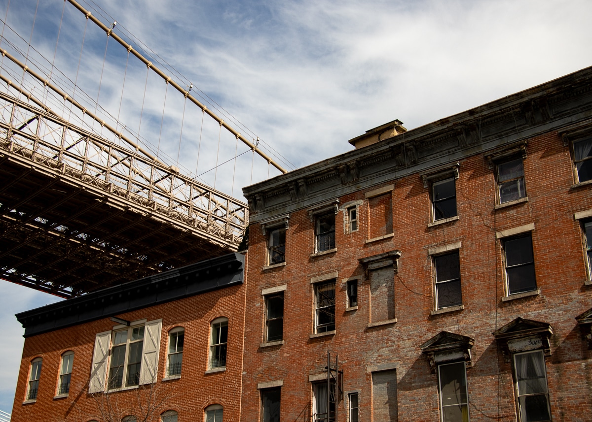 Brooklyn - roadway for the Brooklyn Bridge above brick buildings in Dumbo