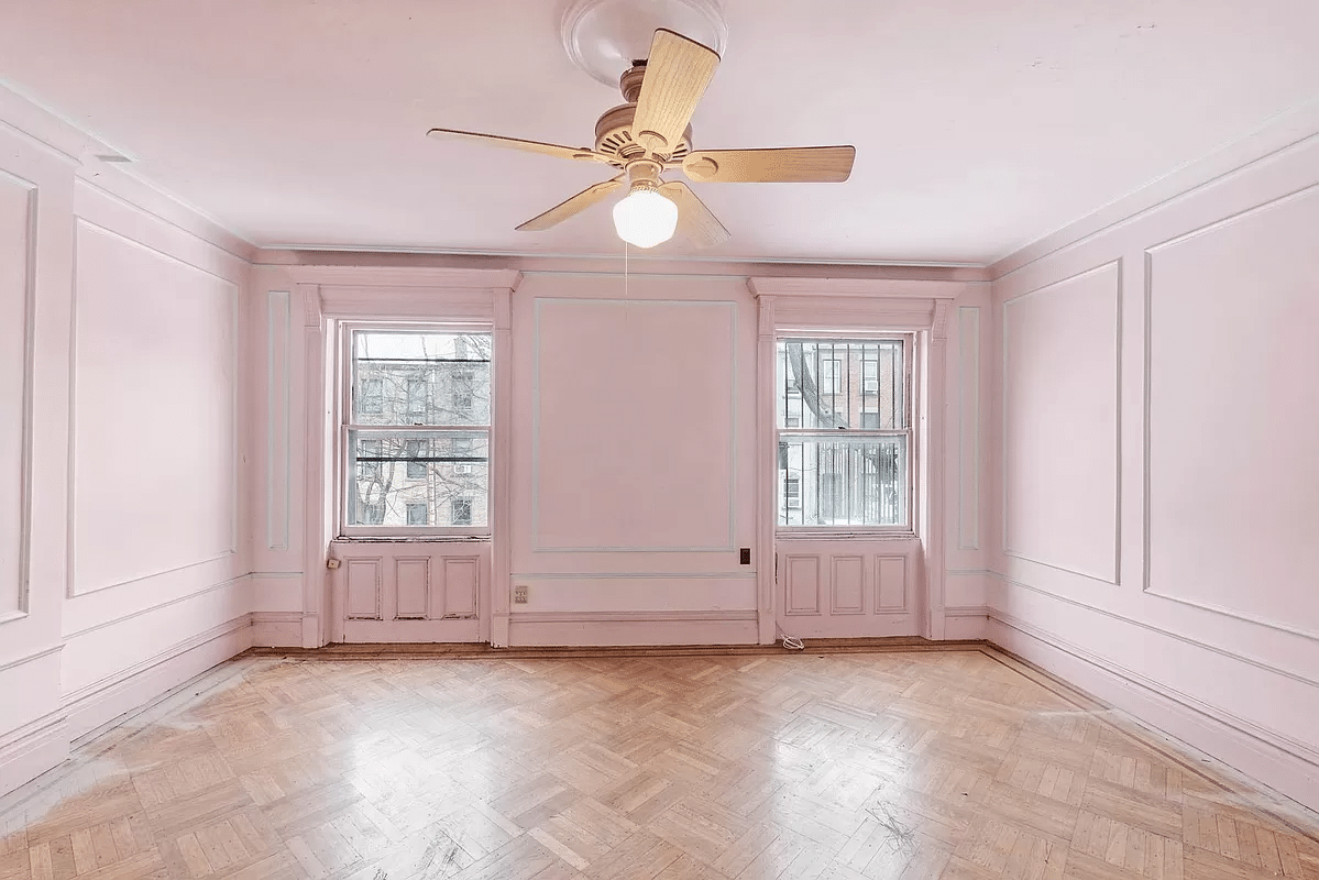 bedroom with walls, moldings and ceiling painted pink
