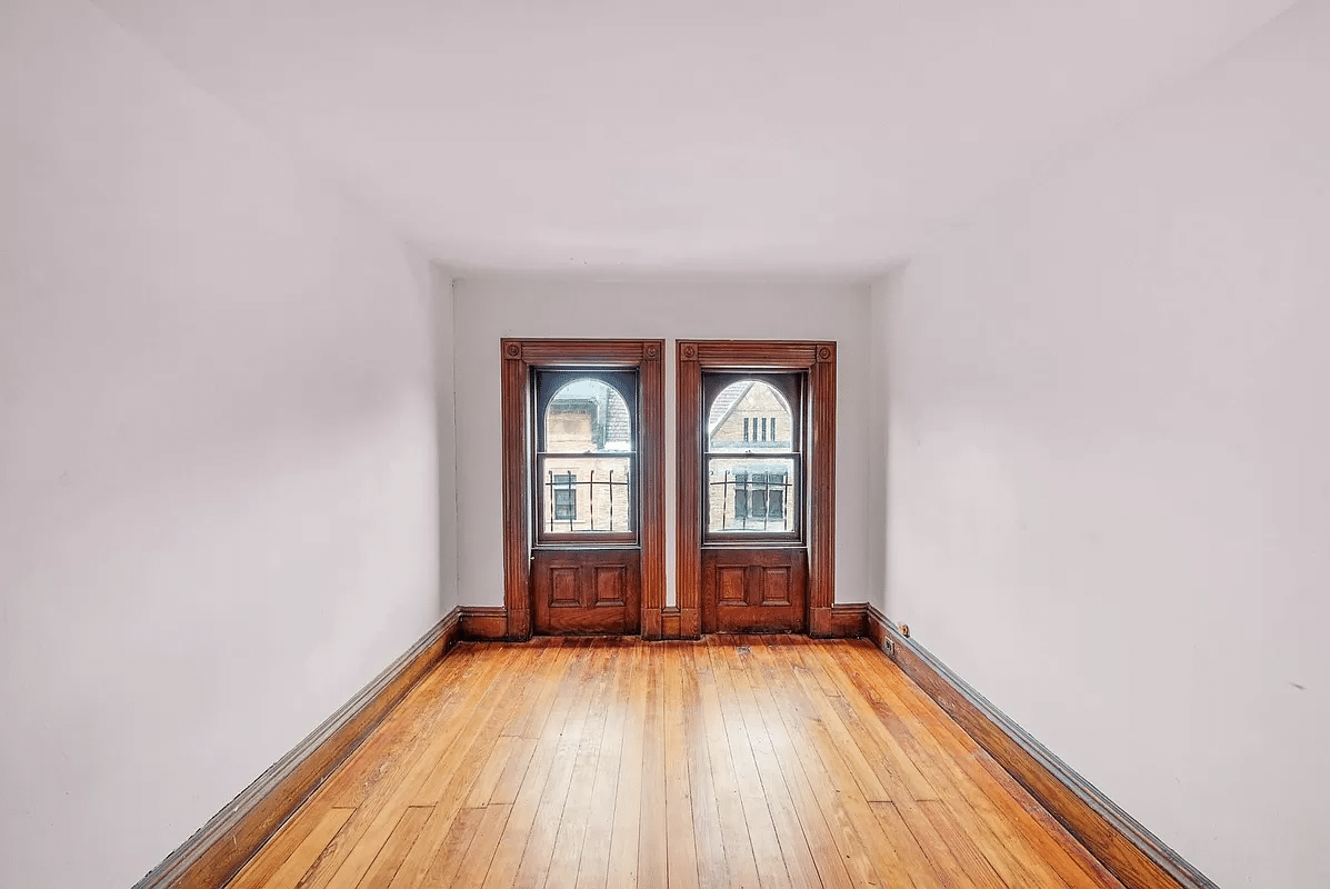 bedroom with unpainted molding