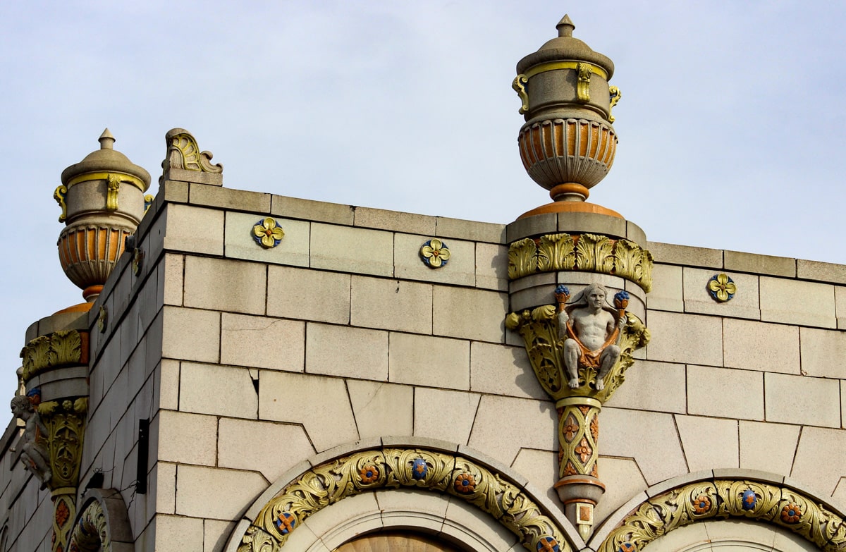 polychrome ornament with urns and floral details