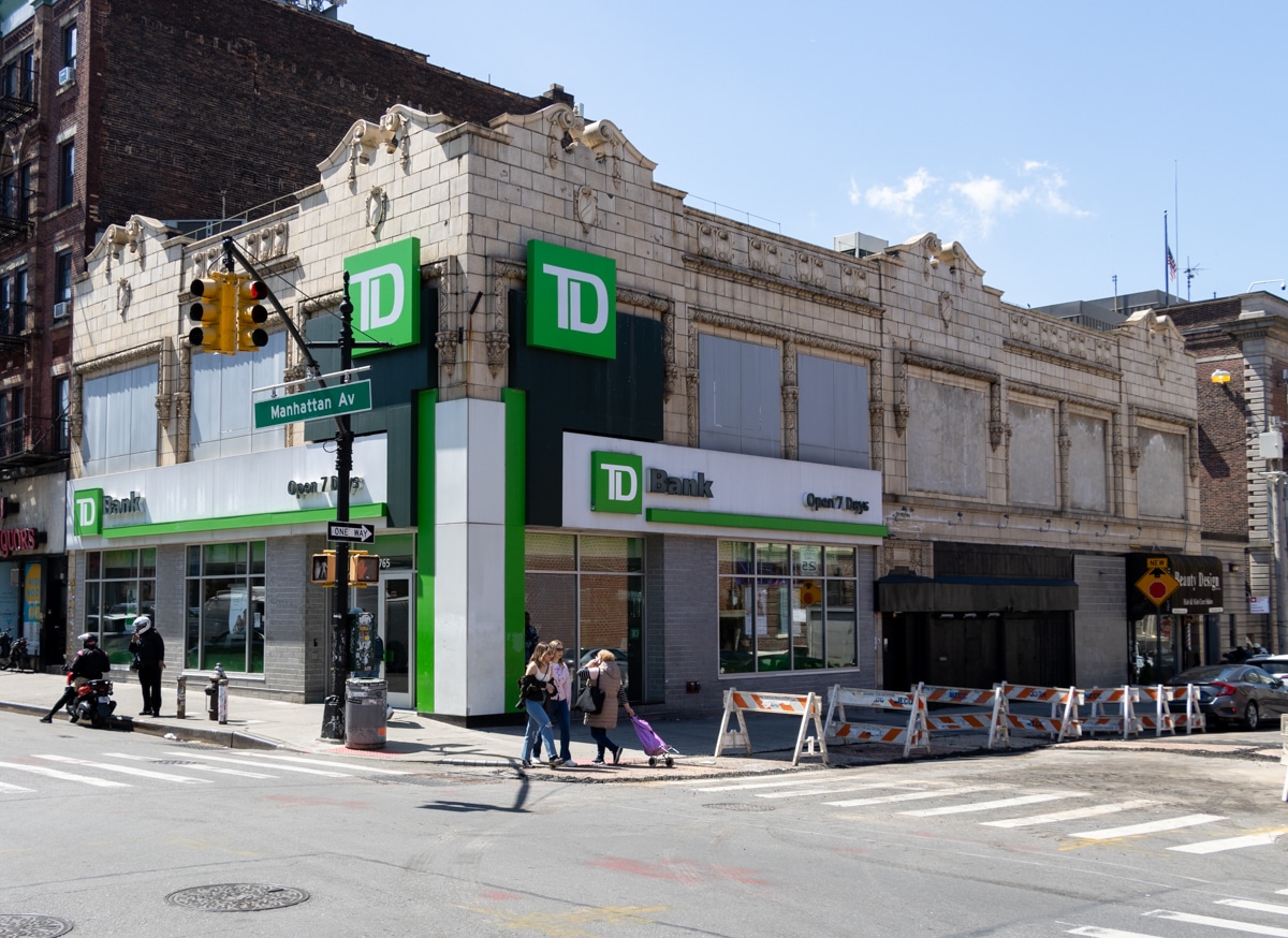 taxpayer - a corner commercial building with an ornate pediment