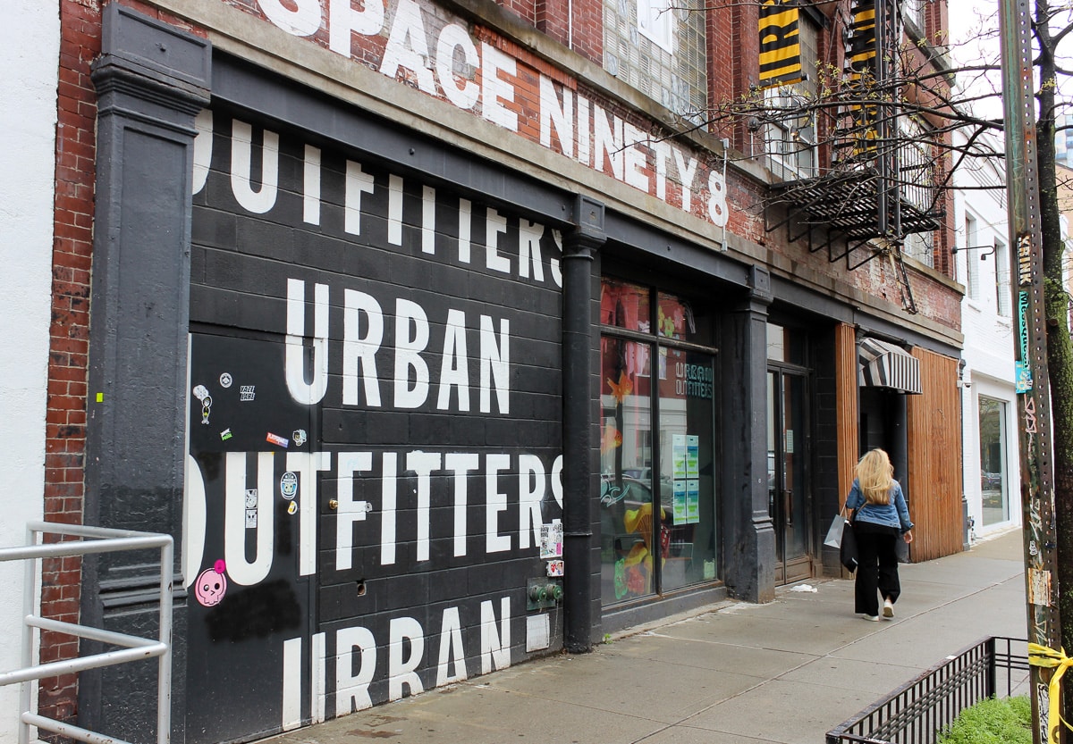 urban outfitters williamsburg - the storefront with a painted sign for space ninety 8